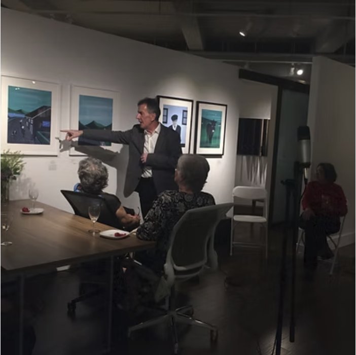 The artist speaking at a New York exhibition of the Images of Ireland paintings