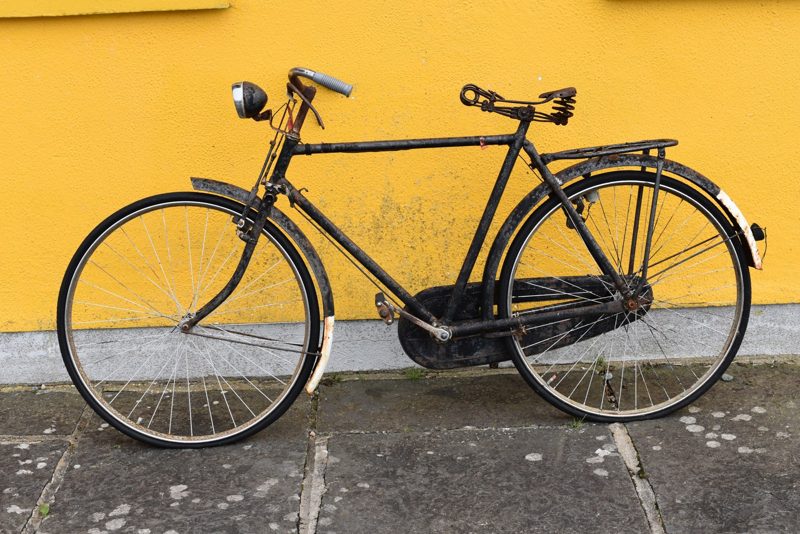 A Bicycle in Ireland, Irish photography print: yellow cottage with a bicycle, Ireland, by Dan O'Sullivan