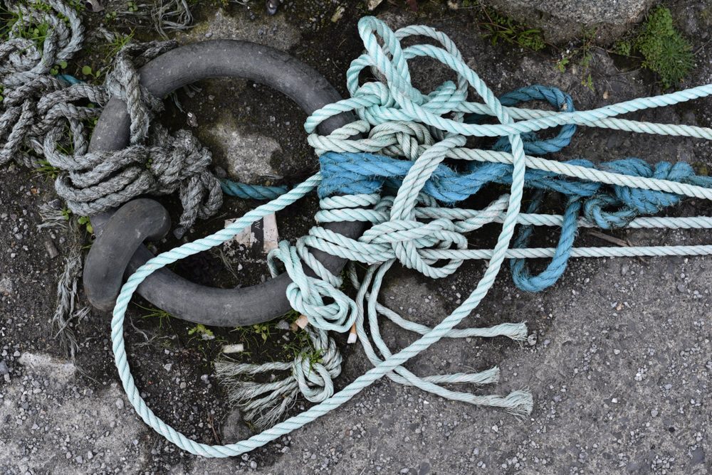 Knots, Irish photography print: tangled blue and aqua mooring ropes on an Irish quay, by Dan O'Sullivan